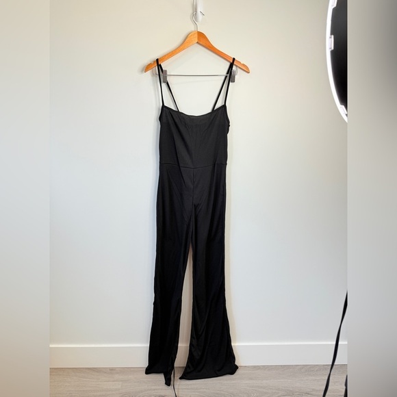 PrettyLittleThing Black Ribbed Strappy Square Neck Flared Jumpsuit - Picture 3 of 9